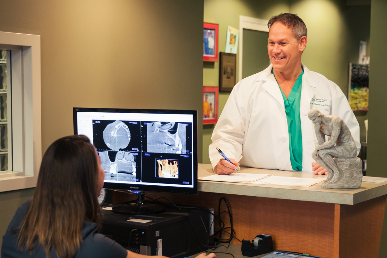 Dr. Homrighausen with a patient